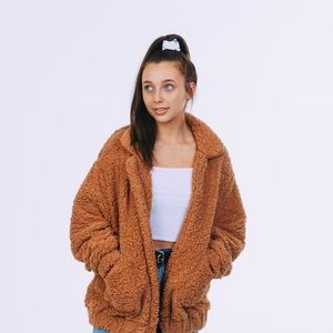 Emma chamberlain poopy jacket